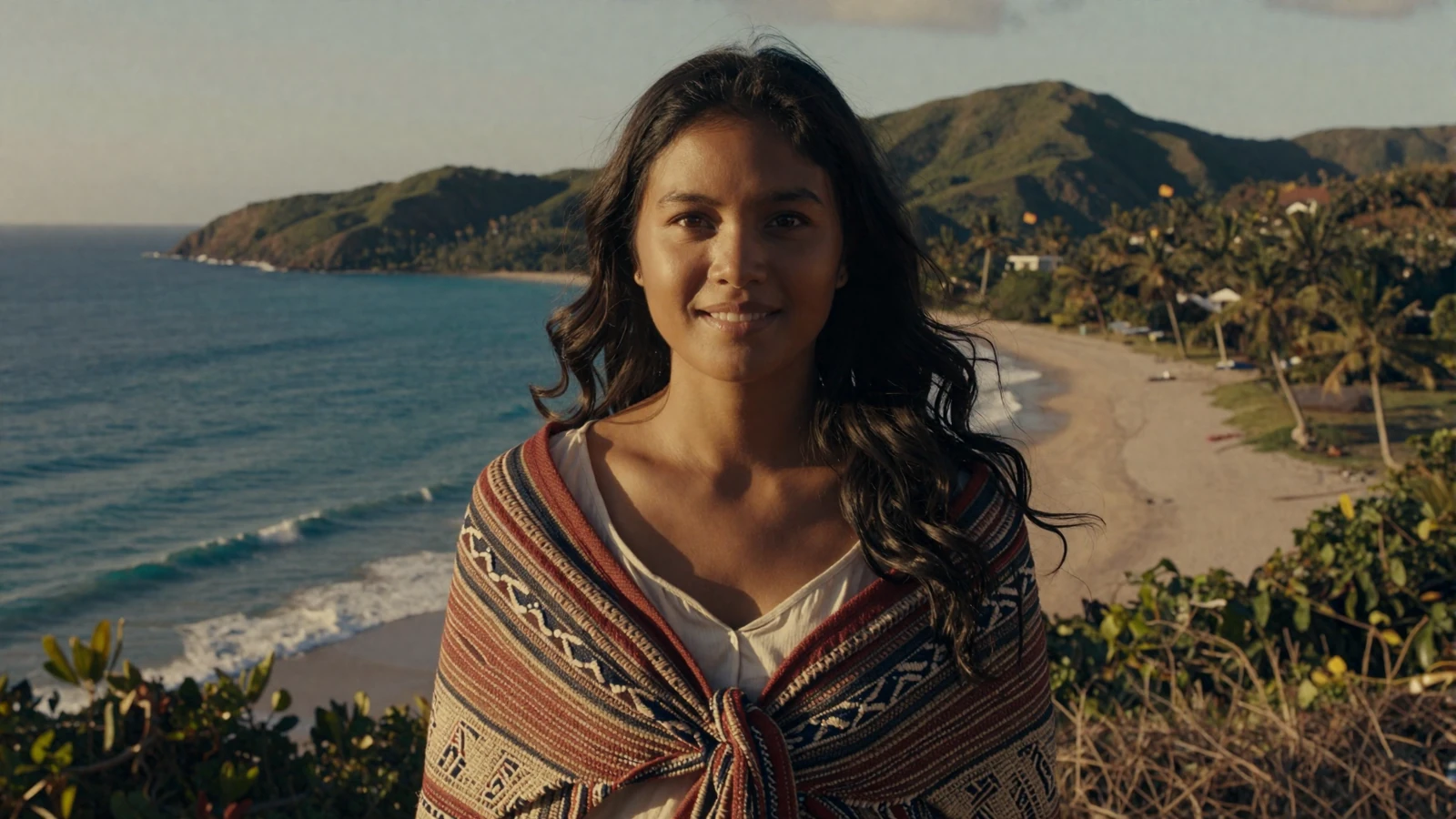 Beautiful Timorese woman in traditional tais wrap standing on East Timor coastline - timorese women dating